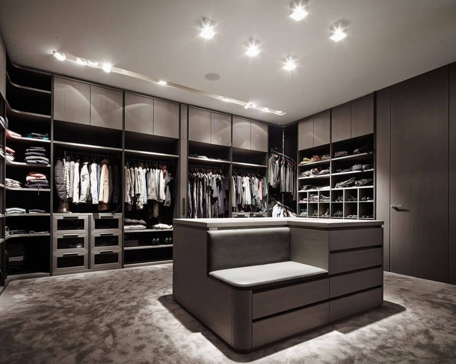 Custom walk-in closet system with built-in shelving